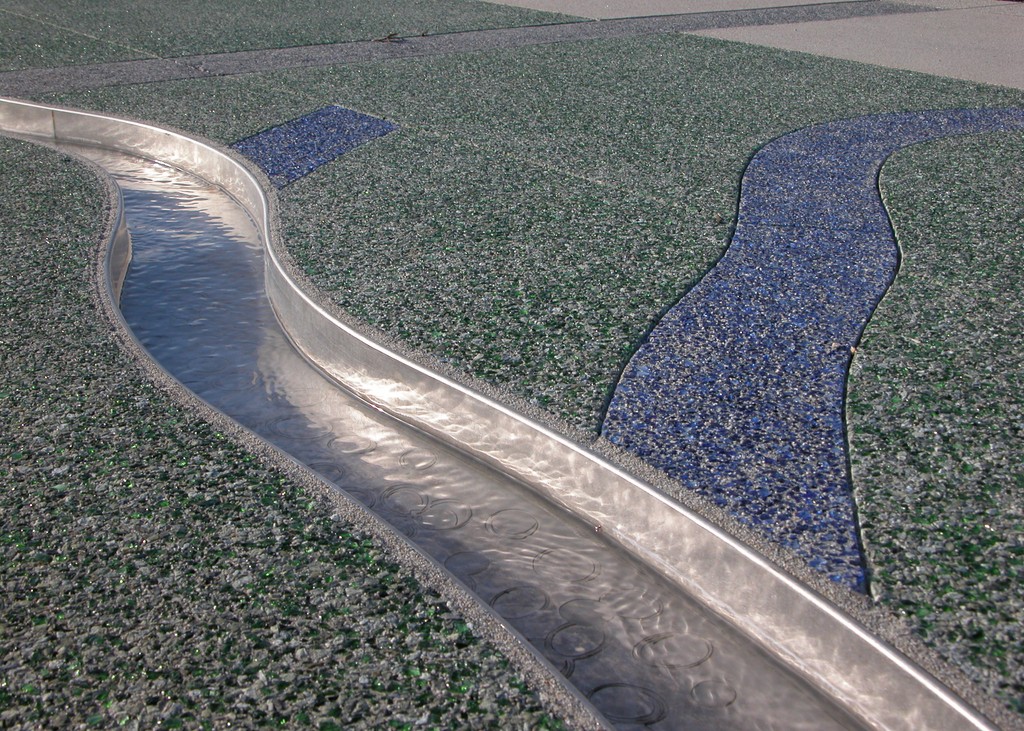 As is true of many modern cities, the early development of Anaheim, Calif., was all about its approach to managing water.  In the following text and images, watershaper and consultant Mark Holden discusses how this history led recently to the completion of a compact public park in which an unusual watershape graphically demonstrates the way water was harnessed and used in the 19th Century to fuel the region’s agricultural and civic growth.    