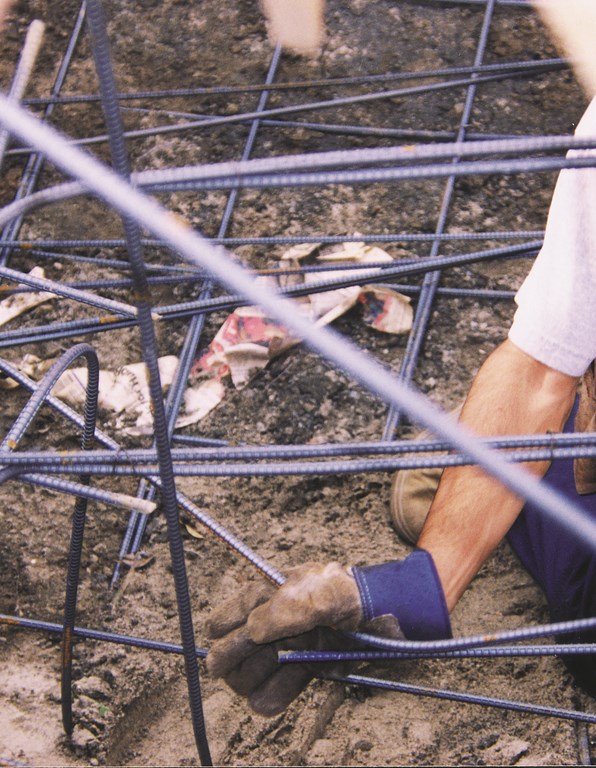 Locked in the middle of walls and floors in everything from tiny fountains to gigantic commercial swimming complexes, a proper cage made up of steel reinforcing bars is the hidden strength that allows a concrete vessel to hold its form, come what may. Here, veteran steel contractor Larry Long takes a look at this key shell-shaping material, explaining what it takes to set up structures that will last a lifetime – and beyond.