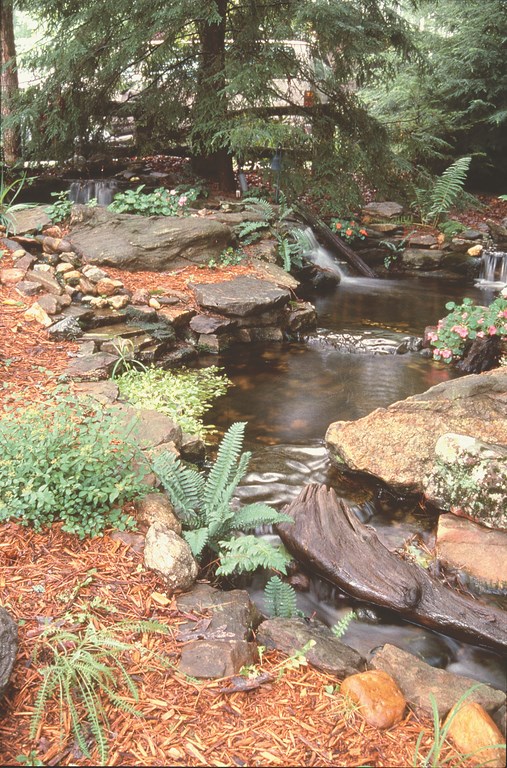 Creating natural-looking cascades and waterfalls requires the deft handling of a range of technical and aesthetic details – the chief of which, observes watershaper Bob Dews, is effective concealment of the water’s source. Here, this specialist in ultra-natural watershapes for residential and commercial clients discusses strategies he uses to hide the headwaters and conjure some distinctly ‘natural’ impressions.