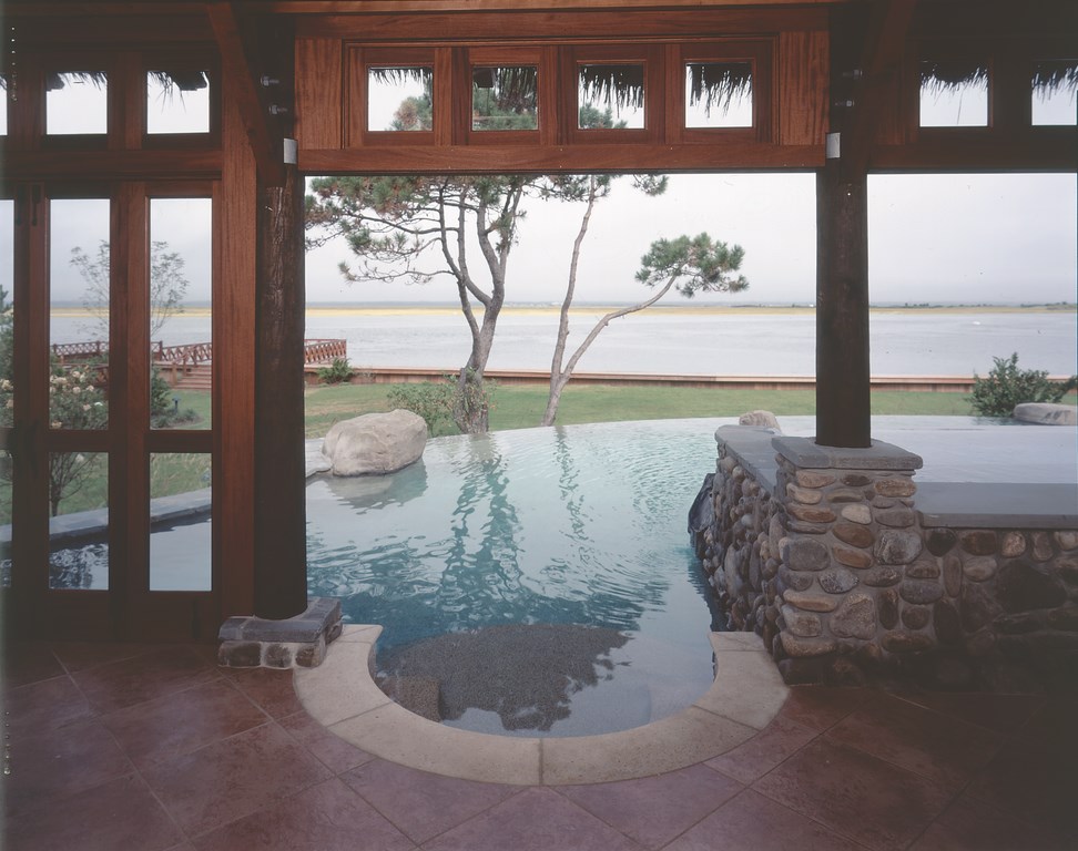 Over a two-year span, watershaper Kevin Fleming and the staff at Lipinski Estate Pools have experienced a nearly complete transformation of focus and purpose. Once designers and builders of ‘ordinary’ gardens and watershapes, they now aim exclusively at custom work for an unabashedly high-end clientele. The results, says Fleming, are greater creative opportunities and satisfaction in the meticulous crafting of exterior spaces and watershapes.