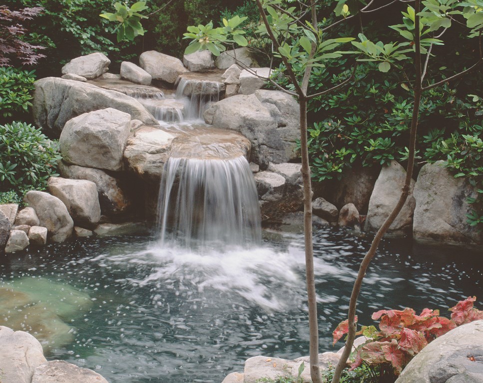Pool builders mostly use some form of reinforced concrete in setting up their watershapes. By contrast, the majority of landscapers and pond builders rely on liners to create their bodies of water. Rubber liners may suit certain low-budget situations, observes Douglas Roth, an expert in the art of Japanese gardening, but when it comes to creating high-quality naturalistic waterfeatures, he says, rubber liners come up short. (Photo courtesy Jim Lampl Landscape Service, Allison Park, Pa.)