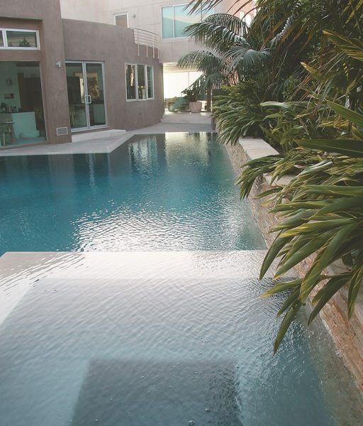 Known as specialists when it comes to executing the designs of top-flight architects and landscape architects throughout Southern California, pool builders Martha and Randy Beard get involved in a wide range of fascinating projects in some of the region’s most exclusive enclaves. Here, they discuss their work on the watershapes of architect Mark Singer, who’s built a sterling reputation by creating contemporary homes with stark, dramatic geometries.