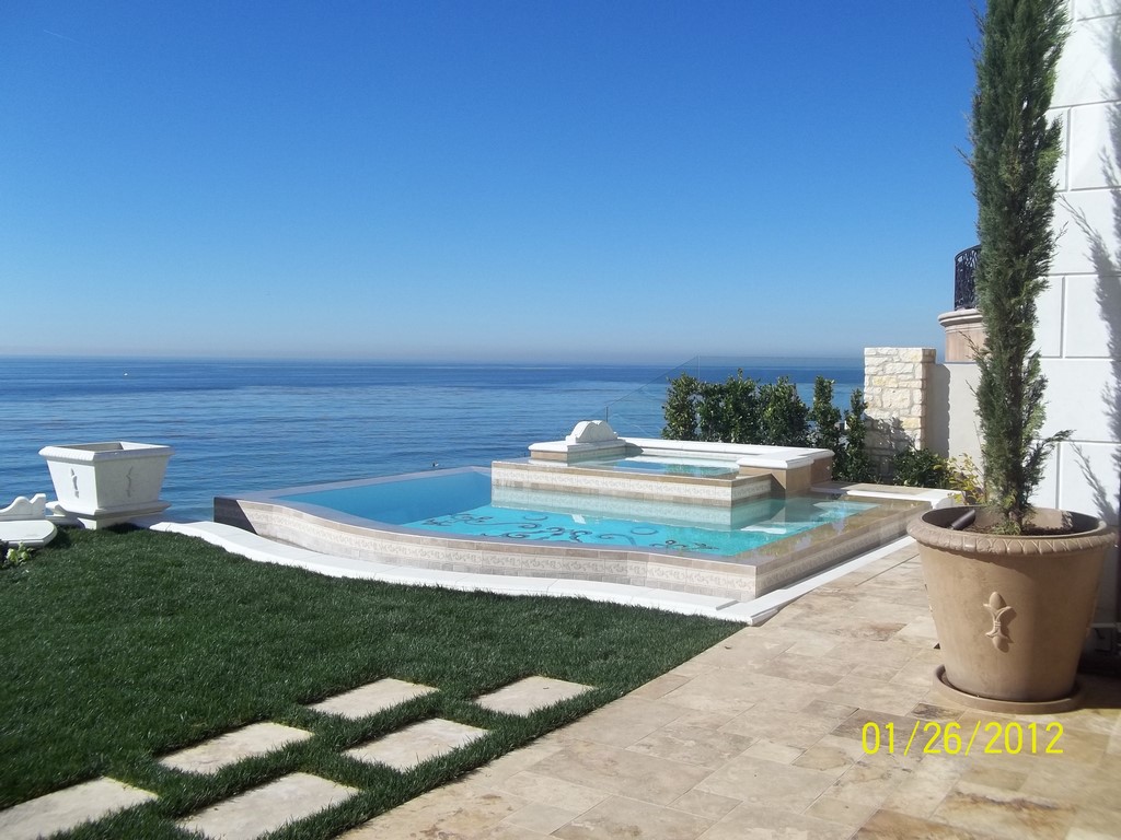 Given its spectacular ocean views, Randy Beard knew that this home called for a pool and spa that didn't get in the way. But that wasn't all he had to consider in designing the watershapes and organizing this remarkable space for entertainment as well as private enjoyment.
